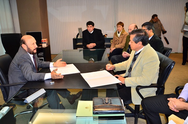 El gobernador Insfrán y el rector Romano